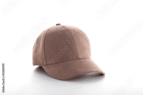 Fashionable beige suede cap with shadows isolated on white background