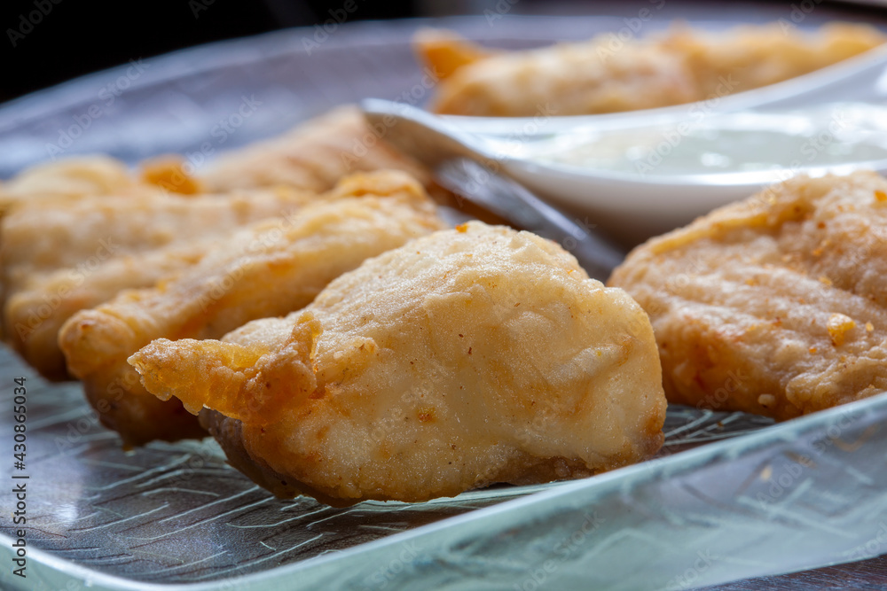 Breaded fish fillet with sauce Breaded fish fillet with sauce