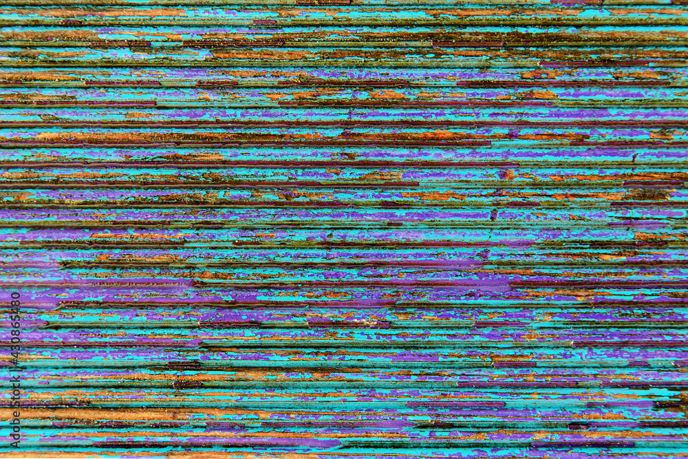 Old shabby textured wood background with cracked colored paint. Backdrop.