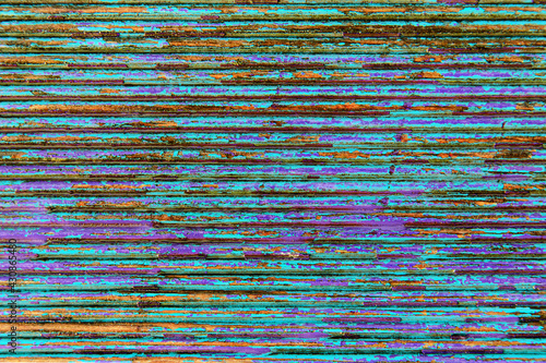 Old shabby textured wood background with cracked colored paint. Backdrop.