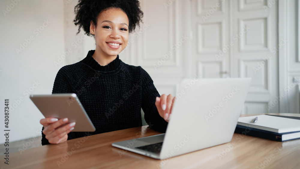 A satisfied freelance student reads a message into a laptop gadget. A female employee of the company is surfing the Internet on a computer. Break during work. A satisfied freelance student reads a message into a laptop gadget. A female employee of the company is surfing the Internet on a computer. Break during work.