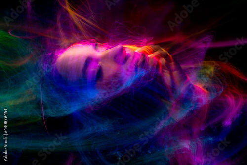 lightpainting portrait, new art direction, long exposure photo without photoshop, light drawing at long exposure	 photo