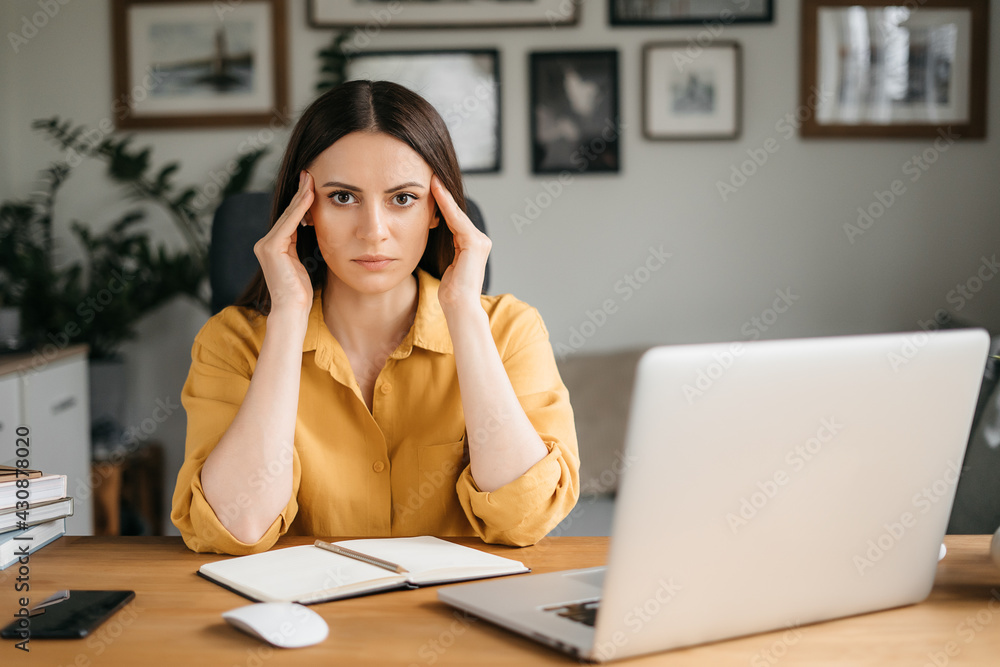 Stressed exhausted young woman tired from computer work feeling fatigue, headache or migraine, overworked teen girl student in panic learning difficult exams preparation, overwhelmed with work tasks Stressed exhausted young woman tired from computer work feeling fatigue, headache or migraine, overworked teen girl student in panic learning difficult exams preparation, overwhelmed with work tasks