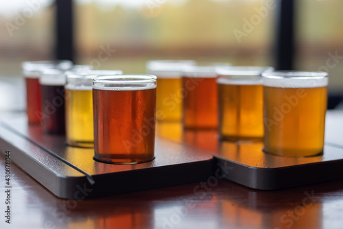 Beautiful variety of craft beer samples on a restaurant table