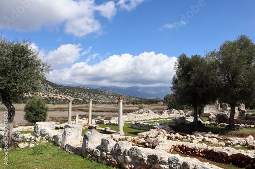 ruins of ancient temple with columns in ruined lycian town Andriake, Turkey