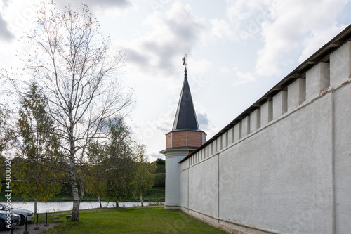 South wall with a tower in Staritsky Holy Dormition Monastery, Staritsa, Tver region, Russia, September 20, 2020 photo