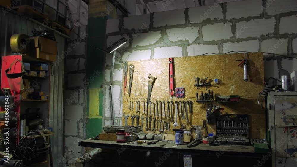 Mechanic tools on the wall in the garage Mechanic tools on the wall in the garage