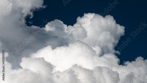 Fototapeta Naklejka Na Ścianę i Meble -  Mountainous Cumulus Clouds Boiling in the Summer Sky