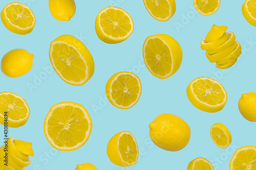 Floating levitating fresh lemon on pastel blue background, Vitamins, healthy diet concept. © Jovica Varga