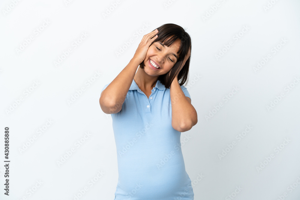 Pregnant woman over isolated white background laughing Pregnant woman over isolated white background laughing
