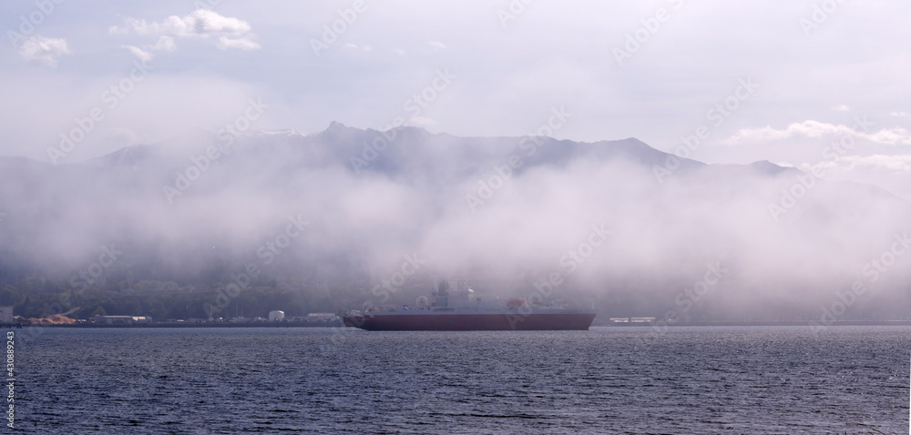 Ship in fog offshore Port Angeles, Washington