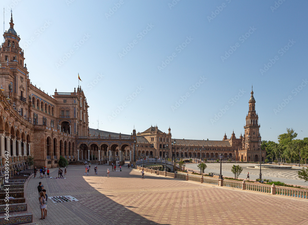 People walking in the Plaza de España in Seville, Andalusia, Spain