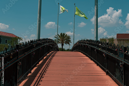 Walking across the bridge of love's padlocks.