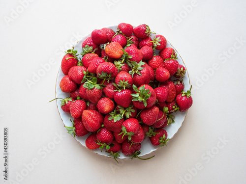 Red strawberries on a plate