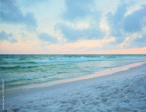 white sand on gulf beach at sunset