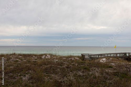dune and walkway to beach on gulf © ASusi