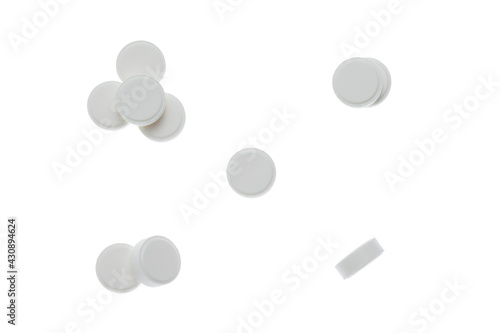 White  round pills isolated on a white background