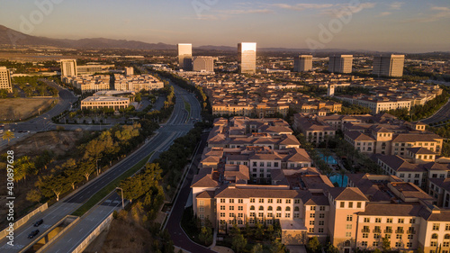 Sunset aerial view of the downtown skyline of Irvine, California, USA.