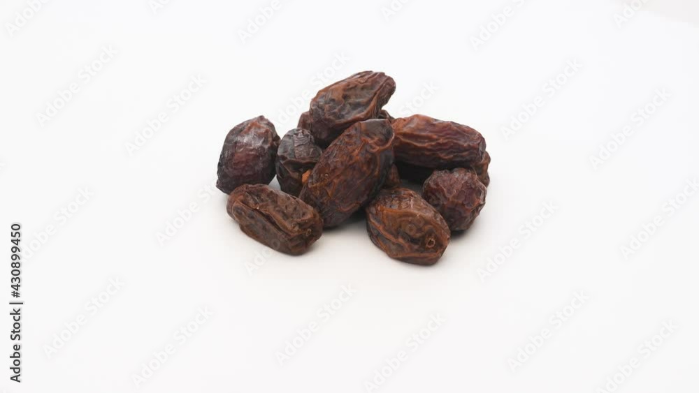 Date Fruit on White Background. Rotating on Turn Table. 4K Resolution.
Date Fruit on White Background. Rotating on Turn Table. 4K Resolution.