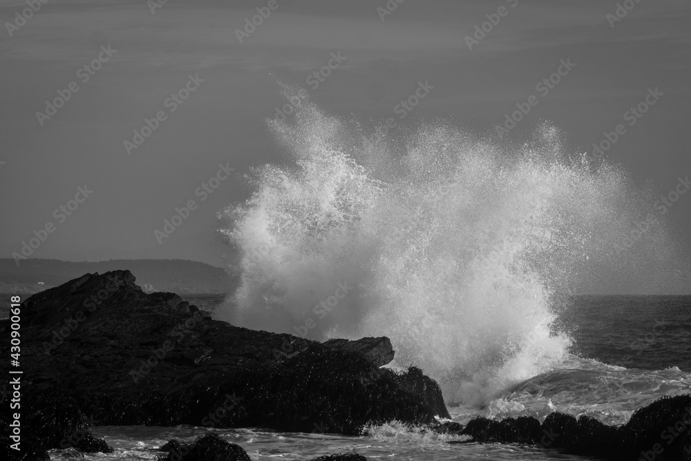 waves crushing on rocks