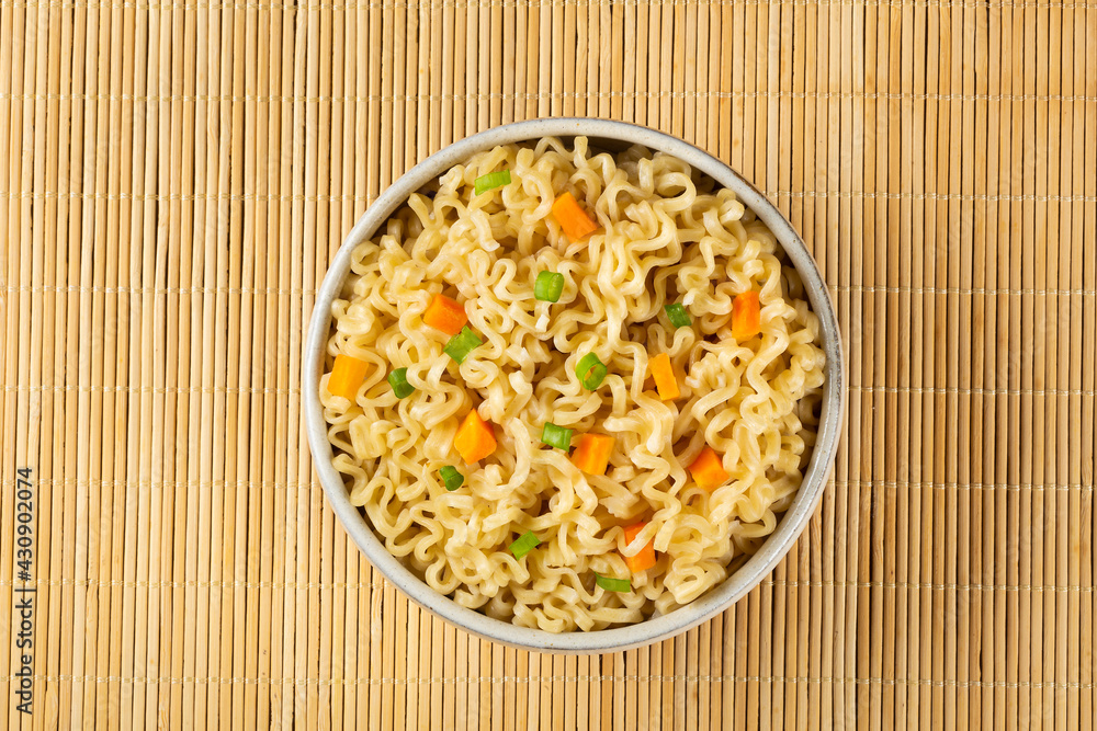 Bowl with instant noodles on the table. Bowl with instant noodles on the table.