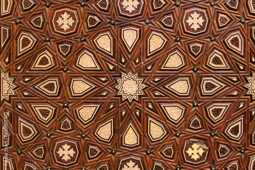 Close up of intricately carved inlaid wood wall, Cairo, Egypt  photo