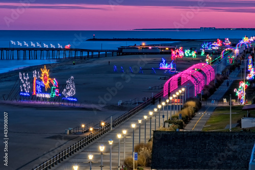 Christmas lights along the boardwalk at sunset;  Virginia Beach, Virginia
