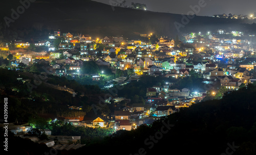 Night scene in the valley bright houses with colorful lights makes the night scene in the countryside more vibrant in the Da Lat plateau  Vietnam