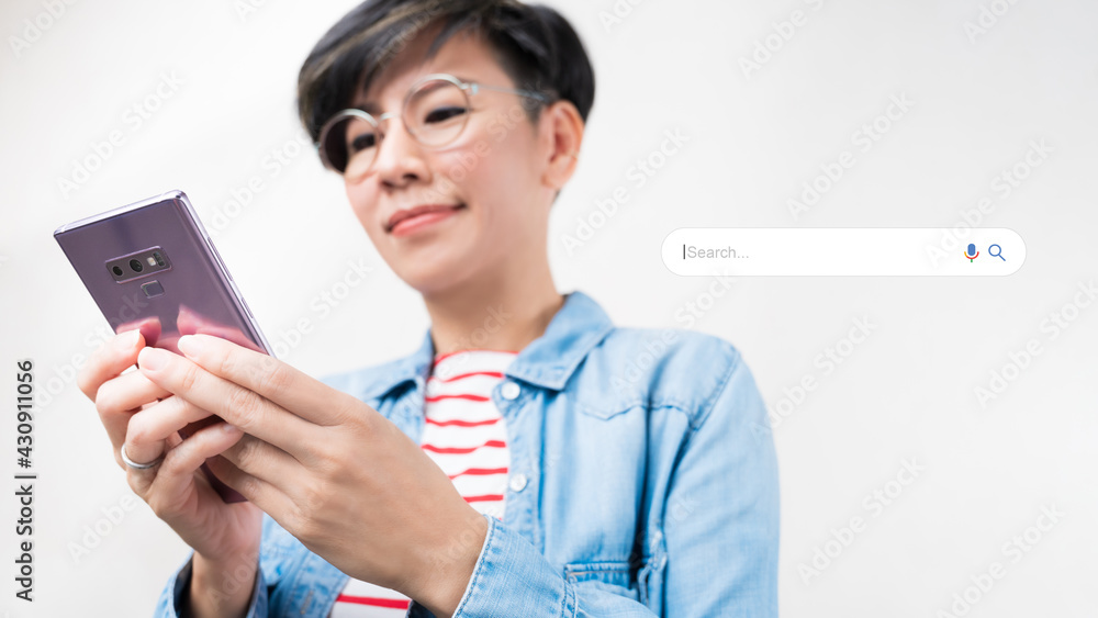 Search Engine Optimization - SEO concept. Close up of a woman's hand typing her smartphone application to search for information. Machine learning, AI Artificial intelligence, Keyword, Lifestyle. Search Engine Optimization - SEO concept. Close up of a woman's hand typing her smartphone application to search for information. Machine learning, AI Artificial intelligence, Keyword, Lifestyle.