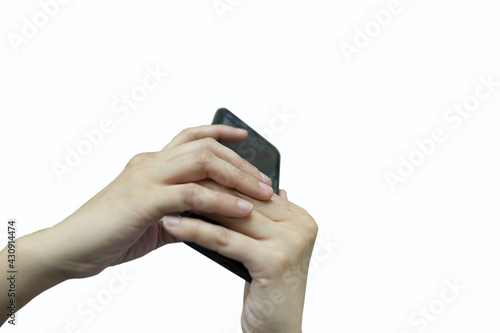 clipping paths,A woman's hand holding a mobile phone In a white floor room.