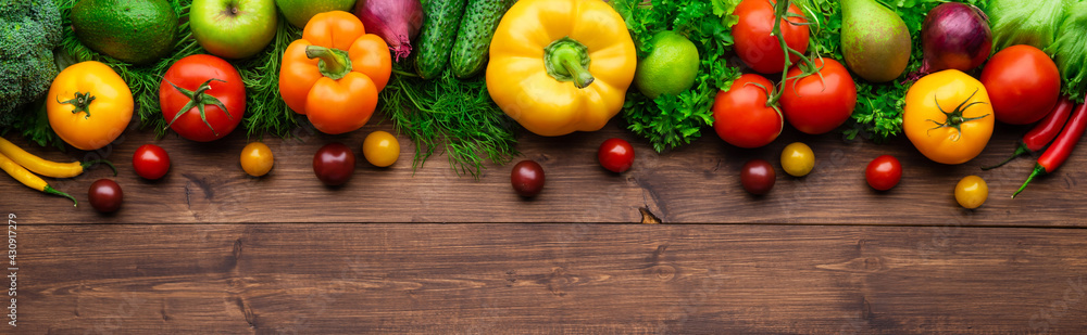Selection of fresh products for preparing healthy and delicious vegetarian and vegan food. Various vegetables and fruits lie on the table. Flat lay. Selection of fresh products for preparing healthy and delicious vegetarian and vegan food. Various vegetables and fruits lie on the table. Flat lay.