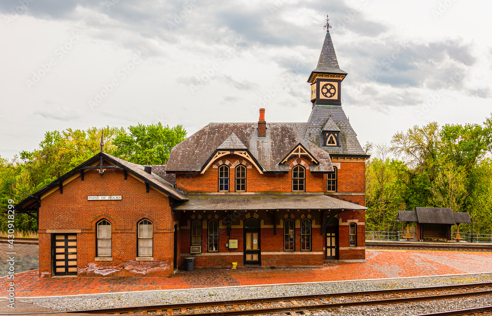 Point of Rocks is a small town on the border of Virginia and Maryland, with historic buildings. Footage shows historic brick railway station build in 1873 as part of Baltimore Ohio railroad Point of Rocks is a small town on the border of Virginia and Maryland, with historic buildings. Footage shows historic brick railway station build in 1873 as part of Baltimore Ohio railroad