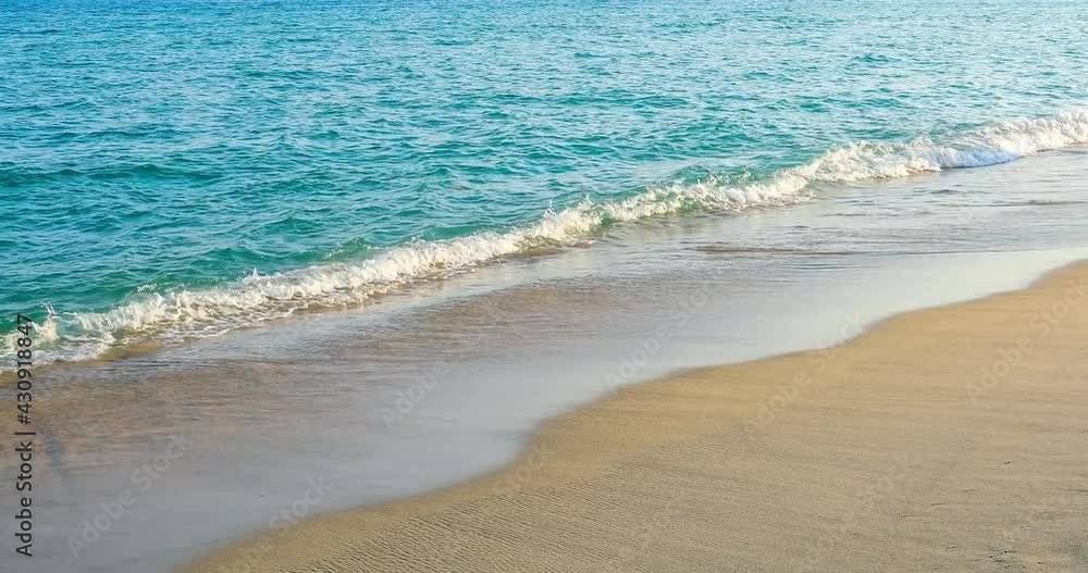 Rolling waves lapping the beach,beautiful seaside scenery. Rolling waves lapping the beach,beautiful seaside scenery.