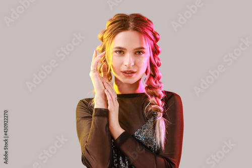 Beautiful young woman with ...