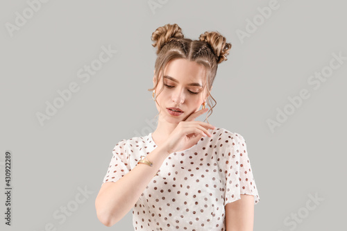 Beautiful young woman with ...