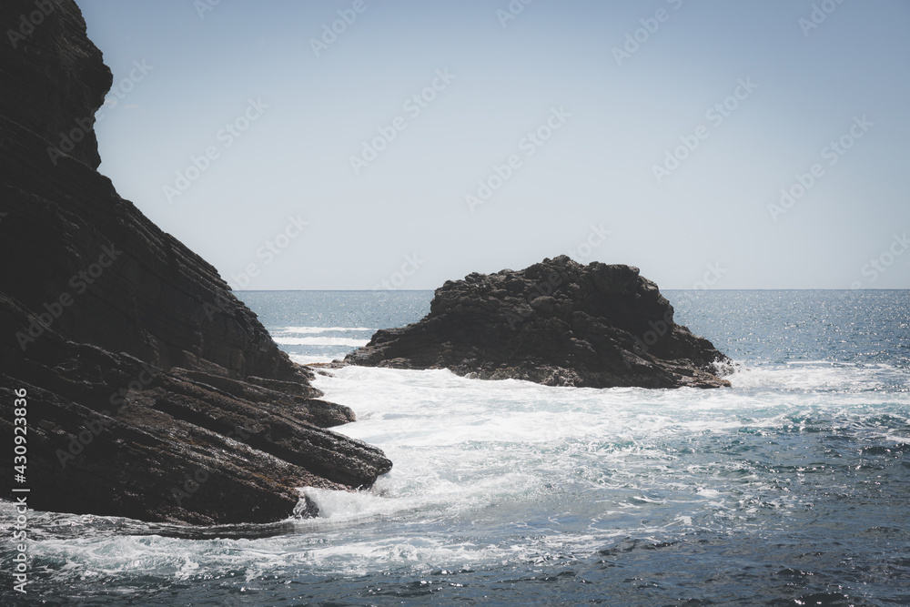 Waves on rocks on the sea