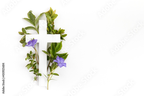 Fotografija The Christianity cross of green leaves