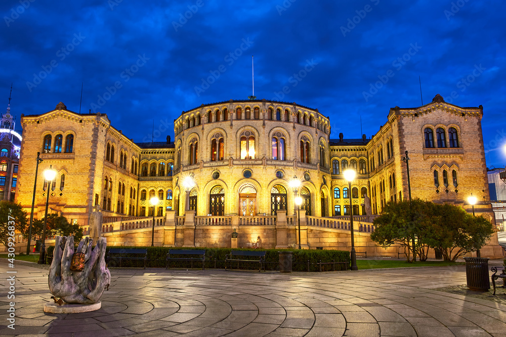 Historic building of Norwegian Parliament at dusk