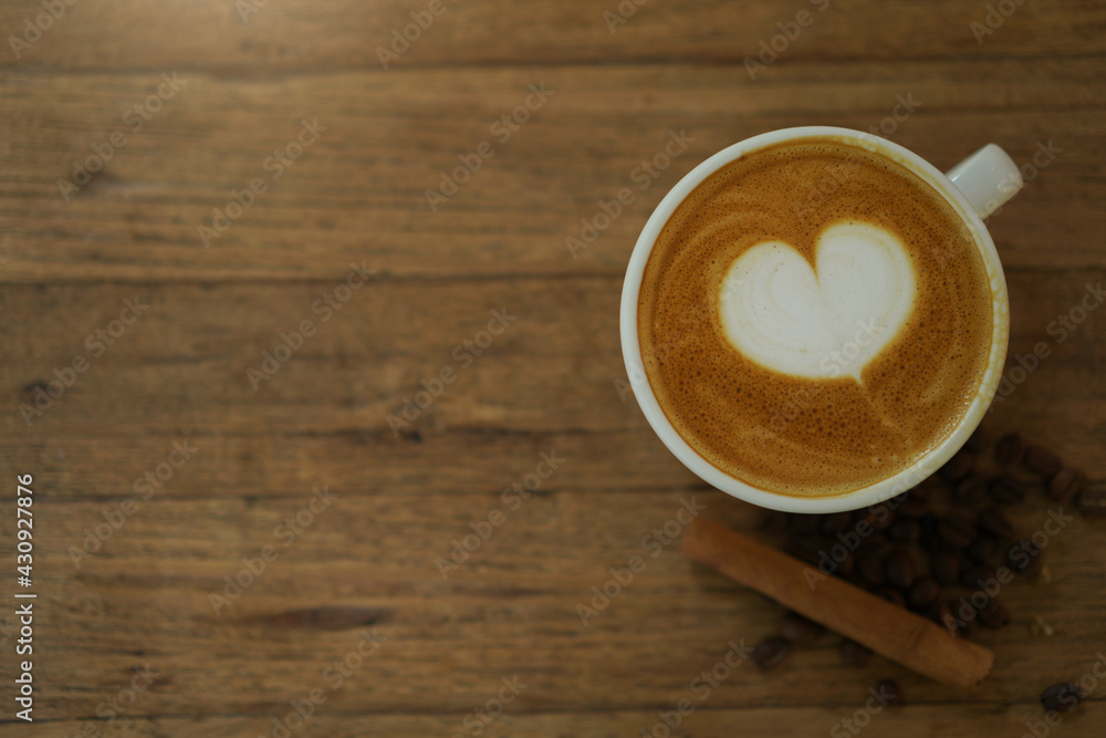 cup of coffee on wooden table cup of coffee on wooden table