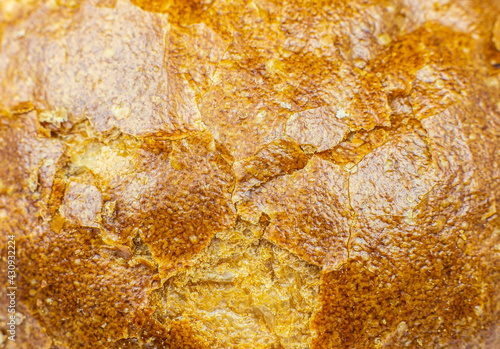 Сrust of bread texture background. Bakery concept. Close up, macro photo.