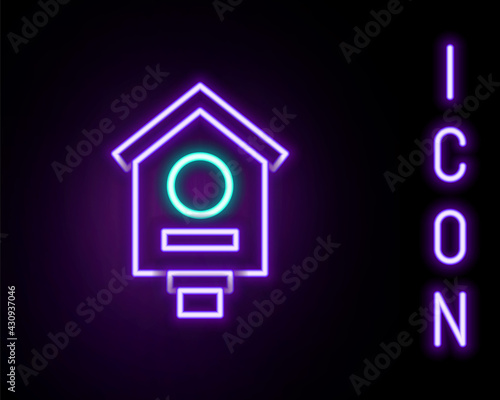 Glowing neon line Bird house icon isolated on black background. Nesting box birdhouse, homemade building for birds. Colorful outline concept. Vector