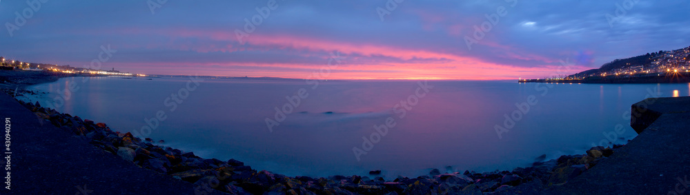 Fototapeta premium Dawn panorama, Mount's Bay, Penzance, Cornwall, UK.