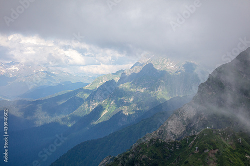 Caucasus mountains in the clouds. © schankz