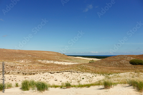 Beautiful landscape with sand dunes and blue sky