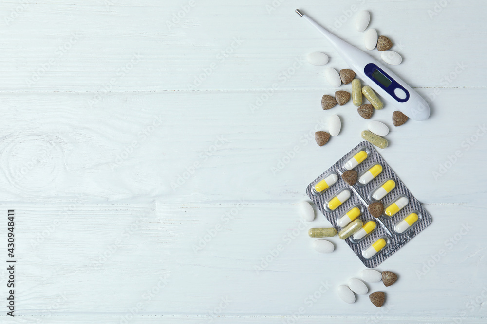 Fototapeta premium Concept of alternative cold treatment on white wooden table, space for text