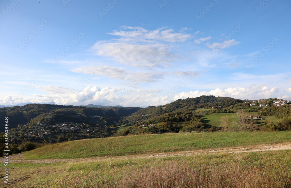 hill landscape with meadows and rolling hills in a sunny day