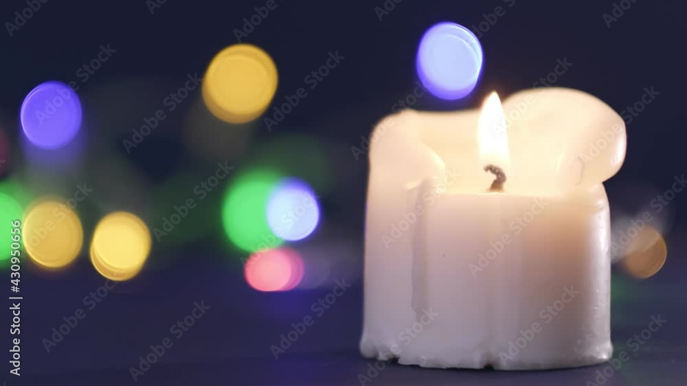 candle in the dark, candle position on the left of the frame. Cozy home