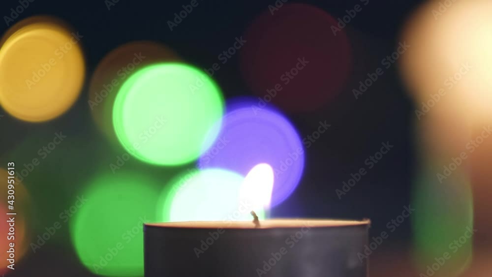 candle in the dark, candle position on the left of the frame. Cozy home