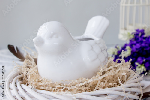 Easter decoration with bird and lilac, inspiration concept