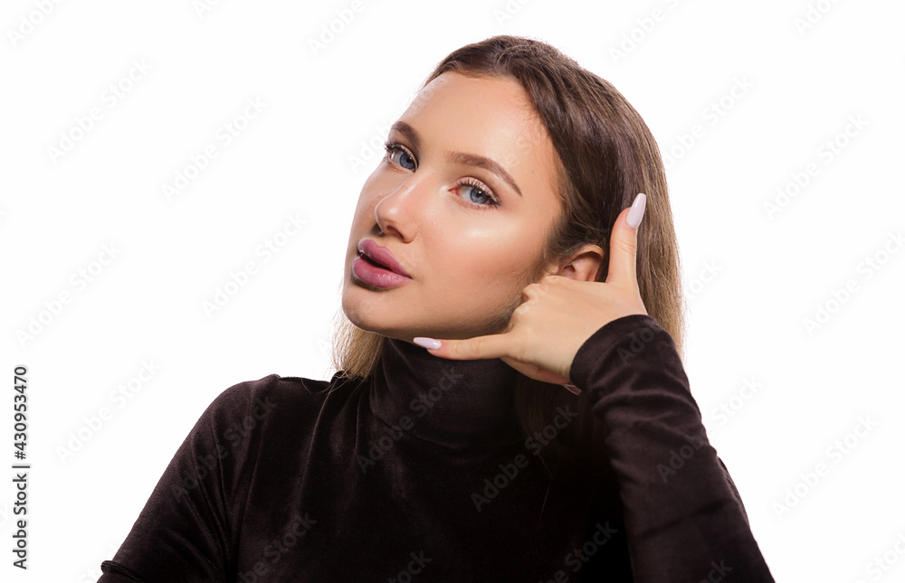 Face expression portrait of beautiful woman with blue eyes making a call me gesture isolated on white background with copy space Face expression portrait of beautiful woman with blue eyes making a call me gesture isolated on white background with copy space
